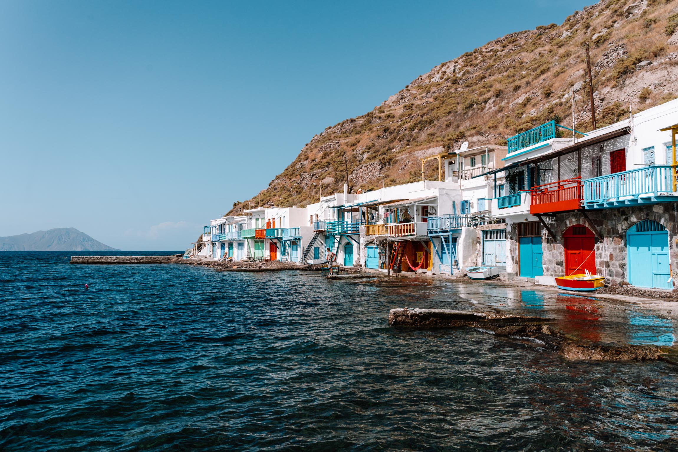 the sea is touching the feet of houses of Klima, Milos island